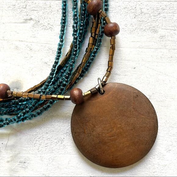 Blue and gold beaded multi strand wood pendant necklace - Picture 6 of 10
